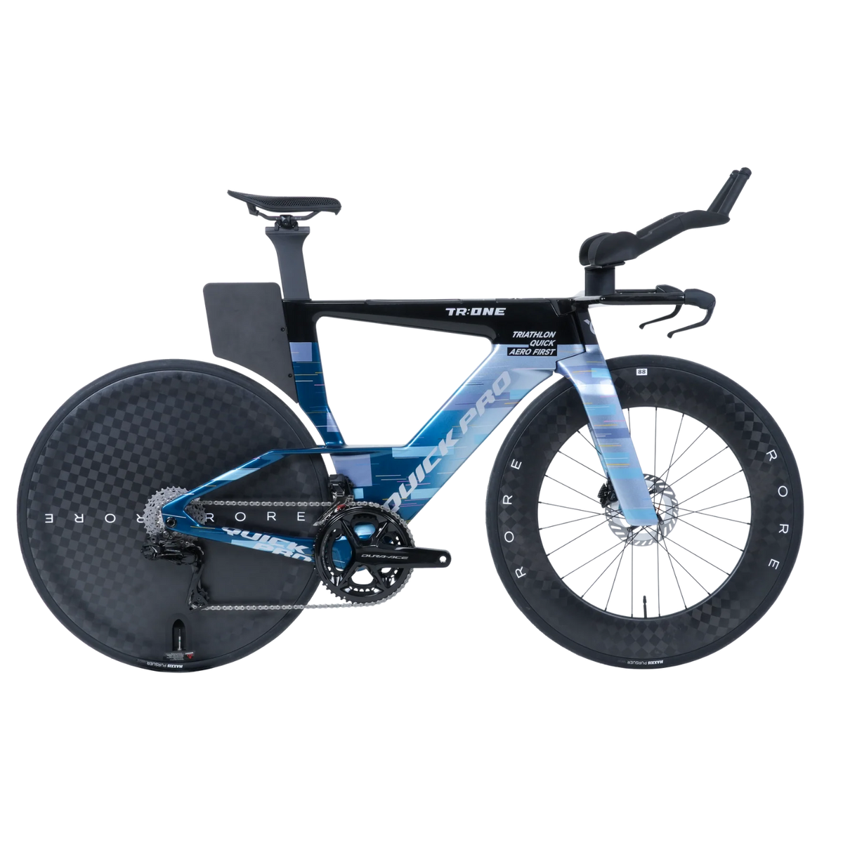 NorVelo TR:ONE triathlon bike in blue and black with aerodynamic carbon frame and disc wheels for racing.