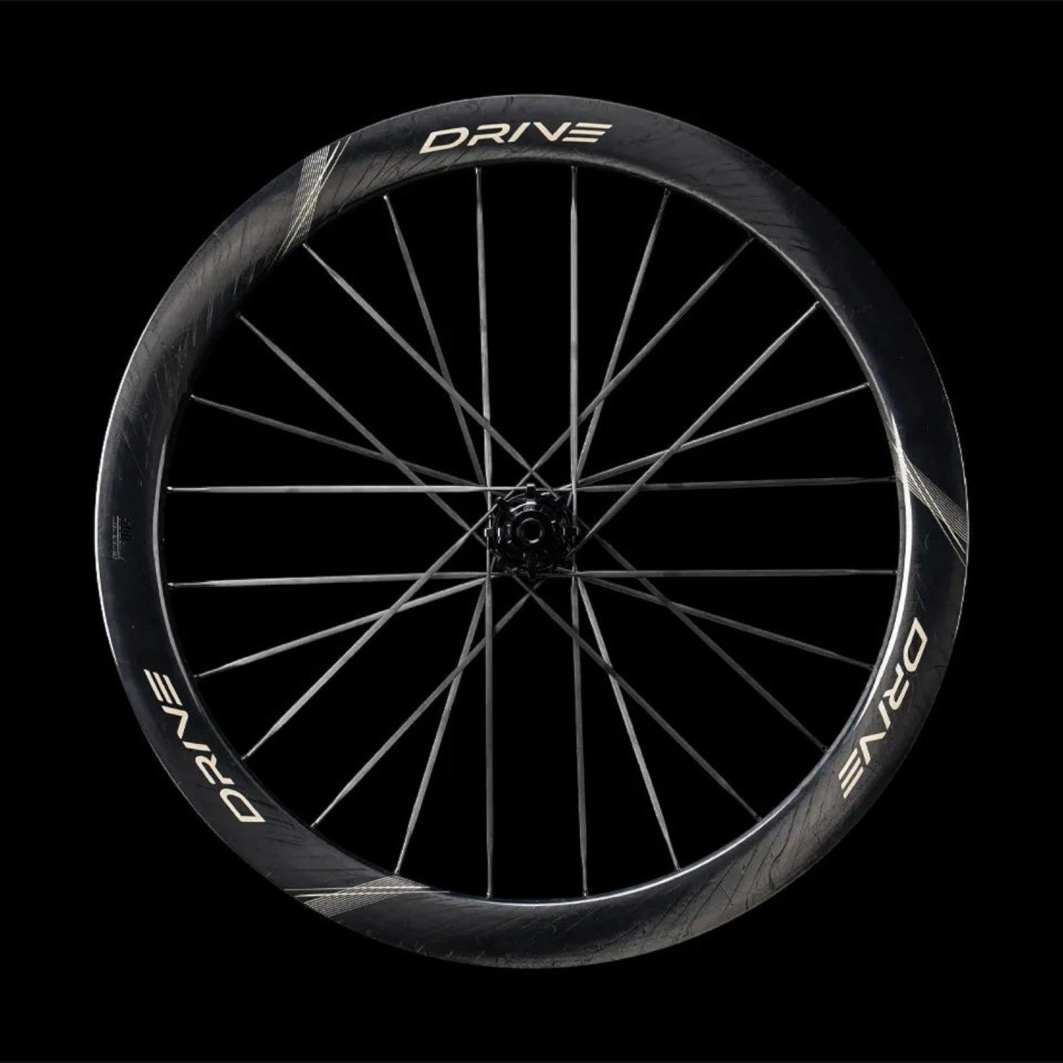 NorVelo Drive 50D II carbon road bike wheel with a 50mm aerodynamic rim profile and black spokes on a black background