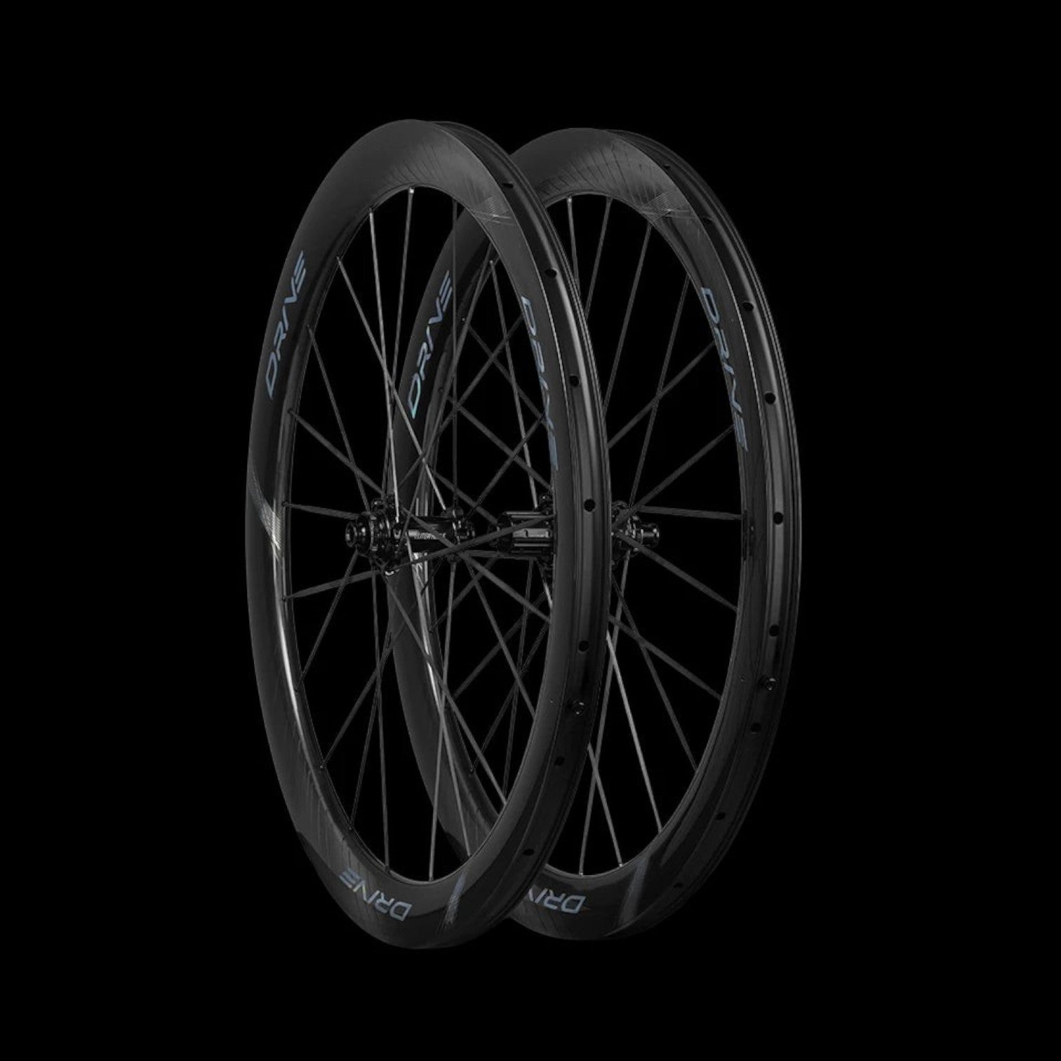 NorVelo Drive 50D II carbon road bike wheelset with aerodynamic U/V-shaped rims in black on a dark background.