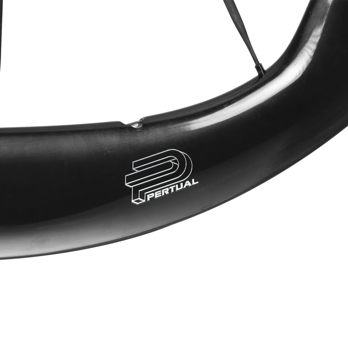 NorVelo Pertual ACME carbon road bike wheel with 45/62mm rim profile and integrated carbon spokes
