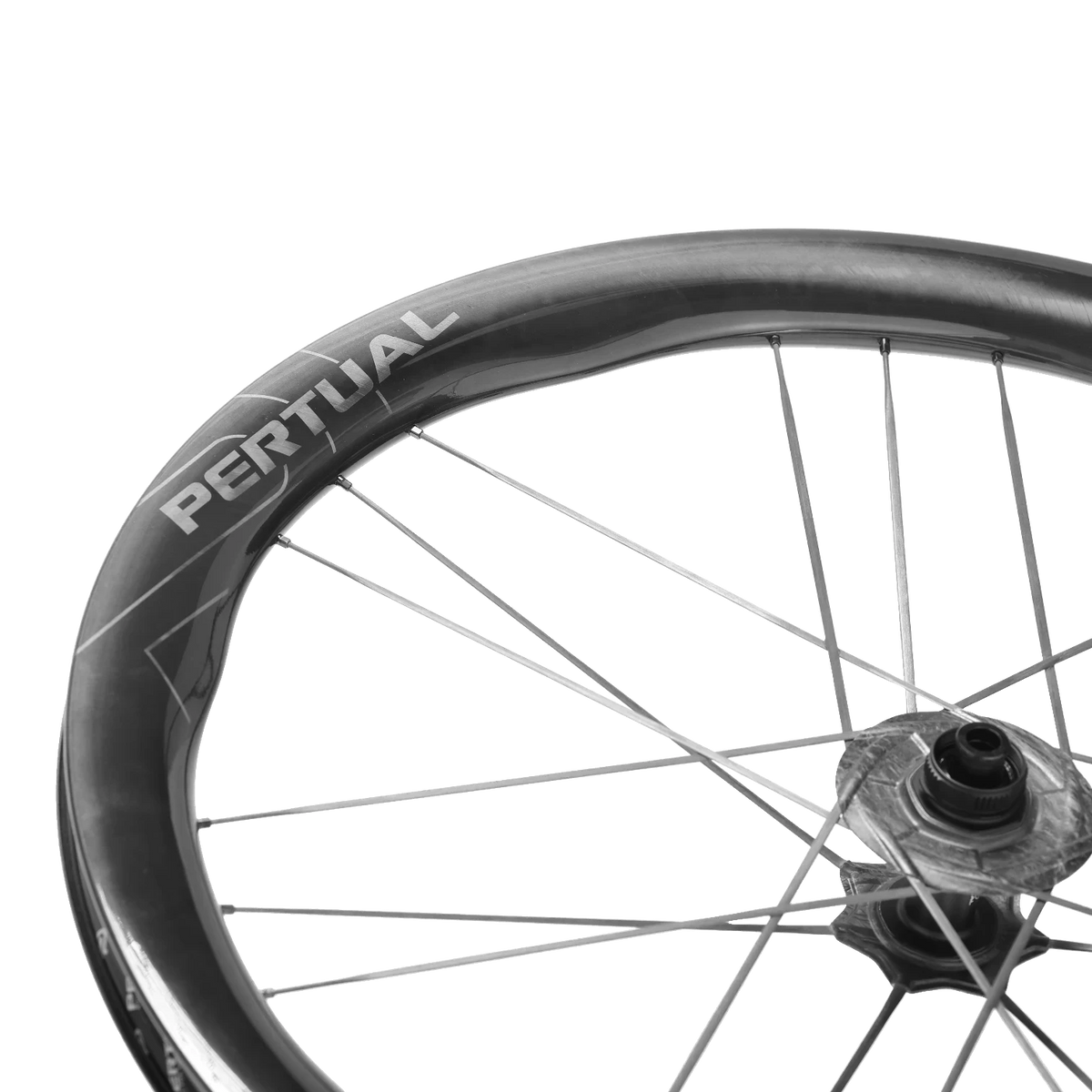 NorVelo carbon fiber bicycle wheel rim with Pertual branding and aerodynamic spokes against a black background
