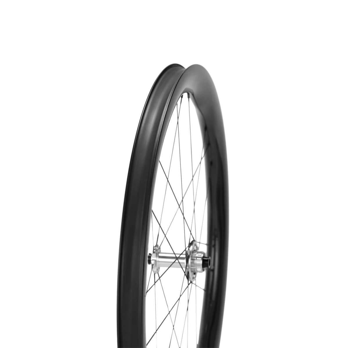 NorVelo Pertual Sharp GR carbon gravel bike wheel with a unique wavy rim profile and silver hub